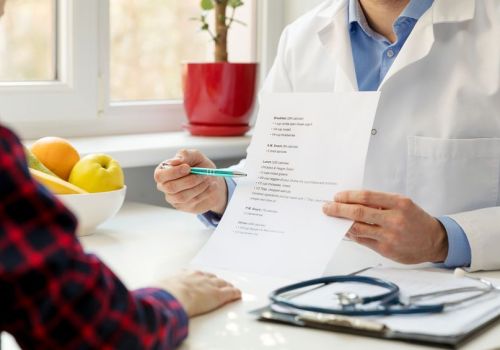 nutritionist and patient discussing balanced nutrition plan in o nutritionist and patient discussing balanced nutrition plan in o